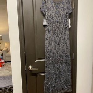 Heavily beaded gown. Brand is BHLDN.